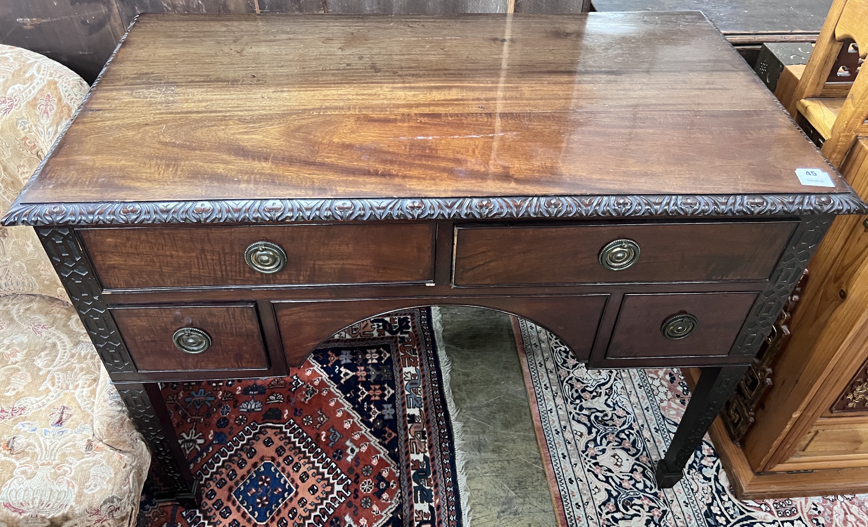 A Chippendale revival mahogany kneehole dressing table, width 106cm, depth 58cm, height 76cm